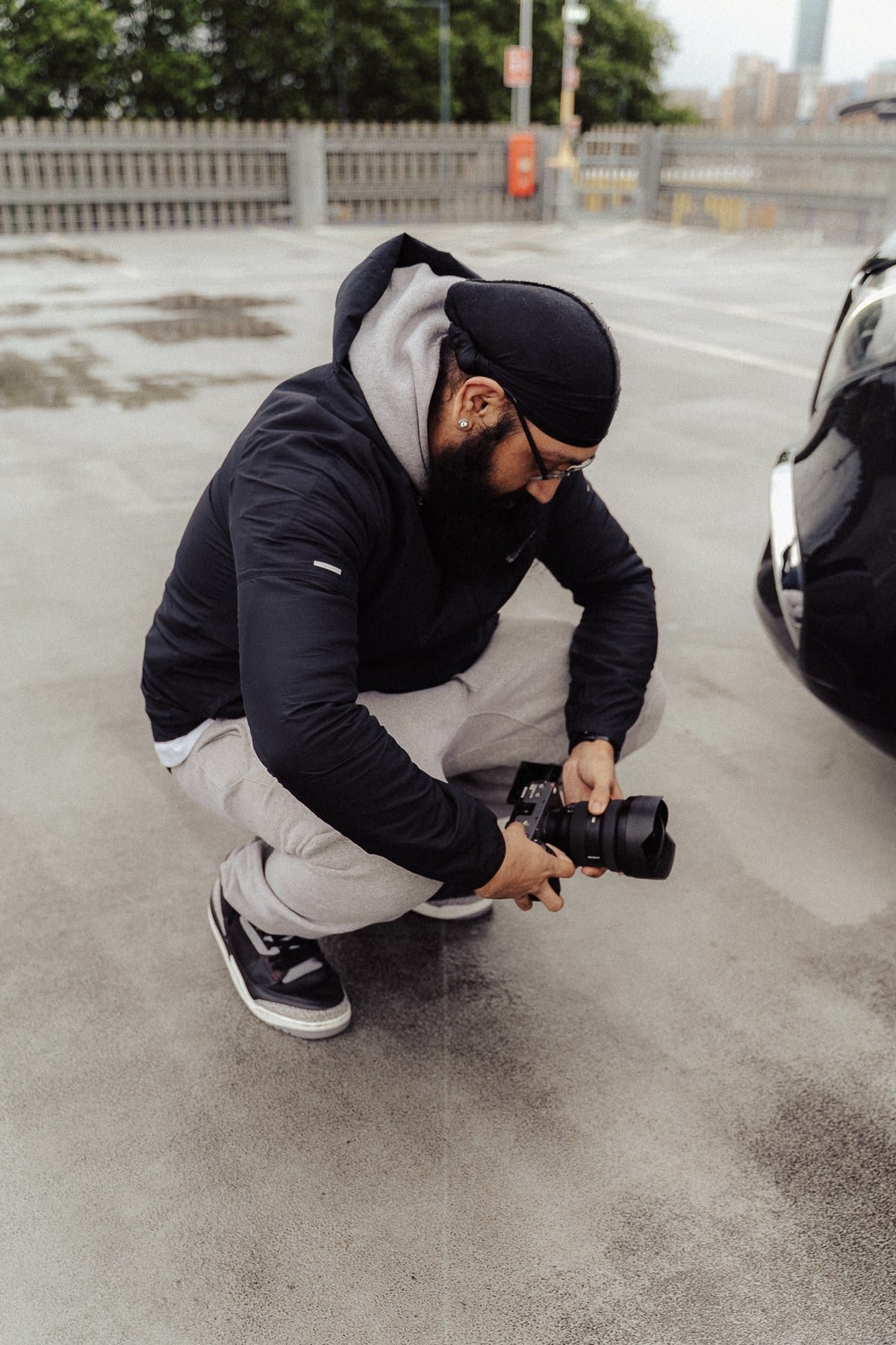 A filmmaker preparing the camera on location