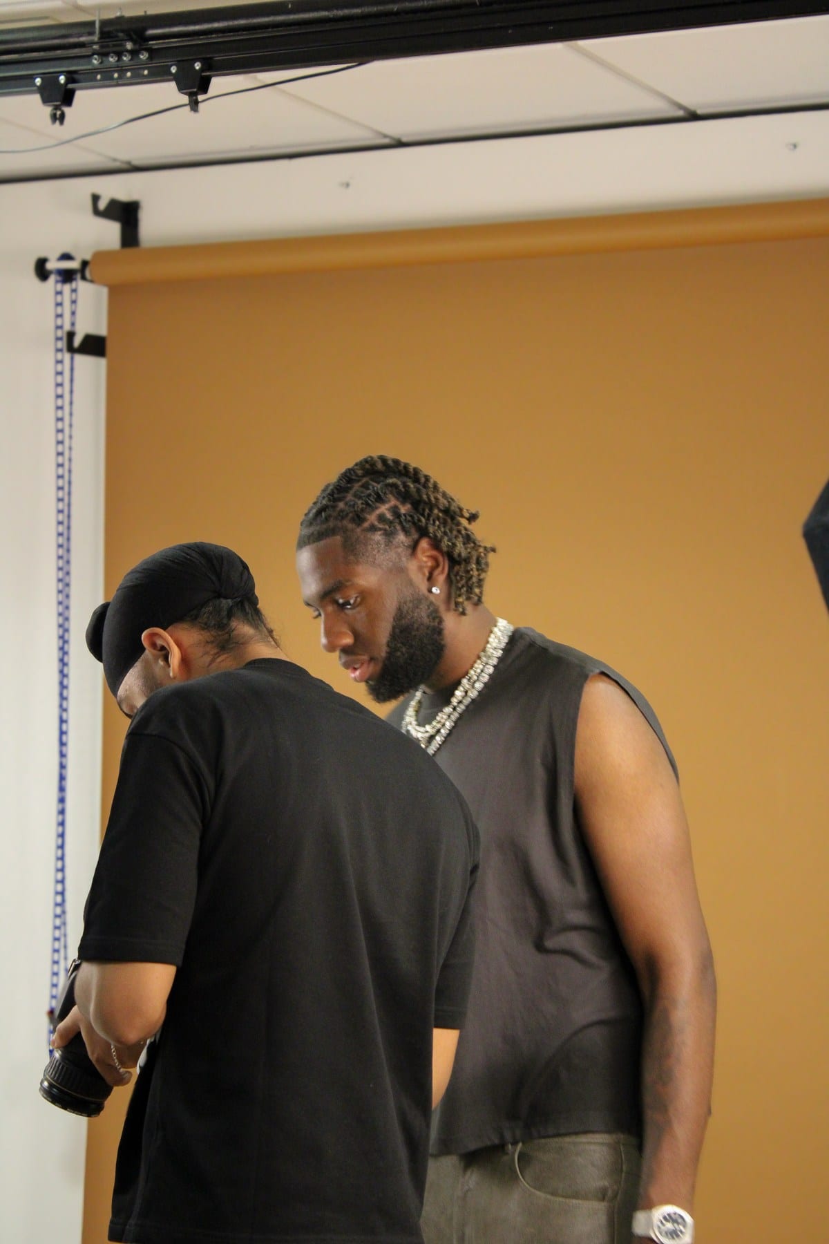 Julio Ade preparing in the portrait studio